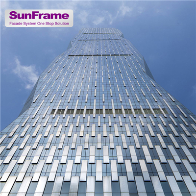 What is a stick-built curtain wall