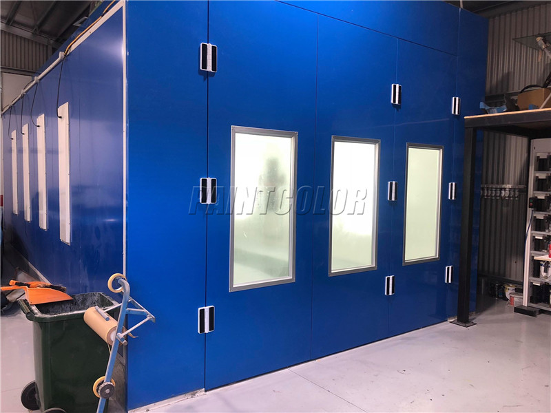 Automotive spray booth with inner ramps and fan cabinet in rear installed in Australia