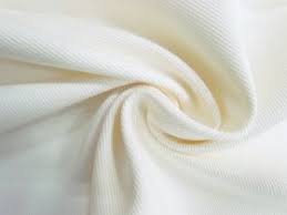 What are the different designs of White Cotton Material?