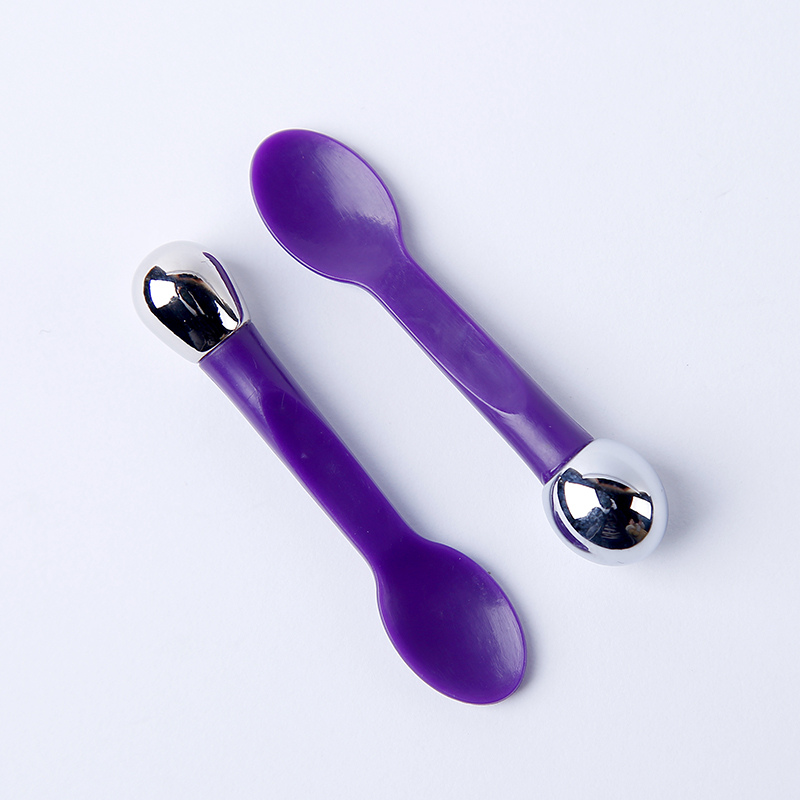 purple cosmetic spatula