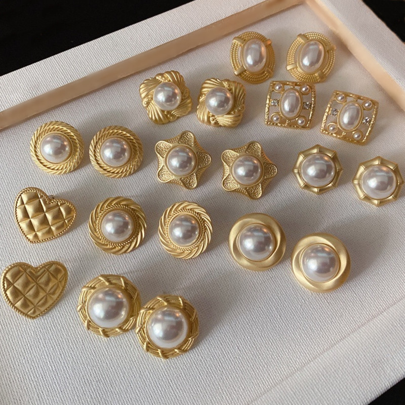 Gold and Pearl Stud Earrings