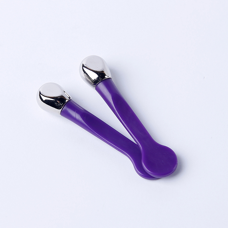 purple cosmetic spatula