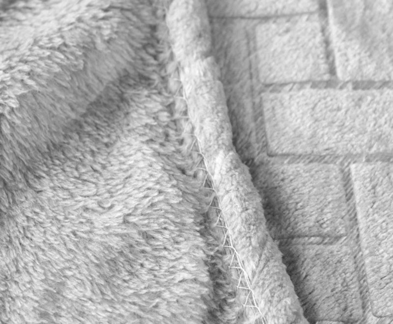 Light grey embossed flannel blanket 1030230