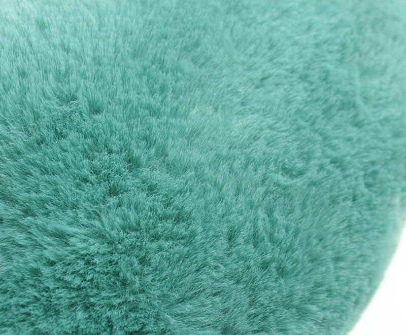 Short plush rabbit fur faux fur cushion with pom poms 9