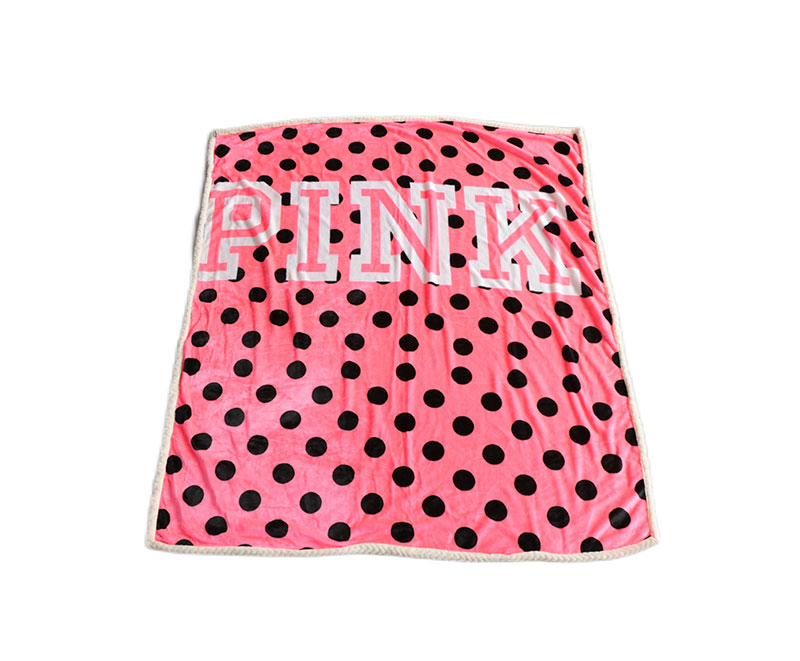 Pink flannel and sherpa blanket with black printed dots 1040531