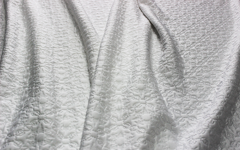 Wrinkle resistant polyester pillow fabric