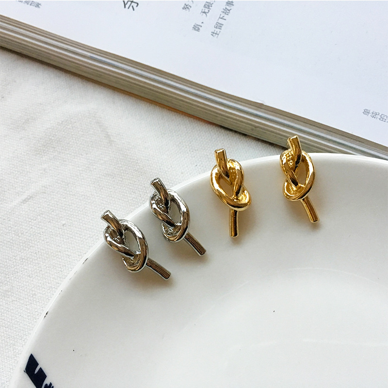 Golden sailor knotted rope stud earrings