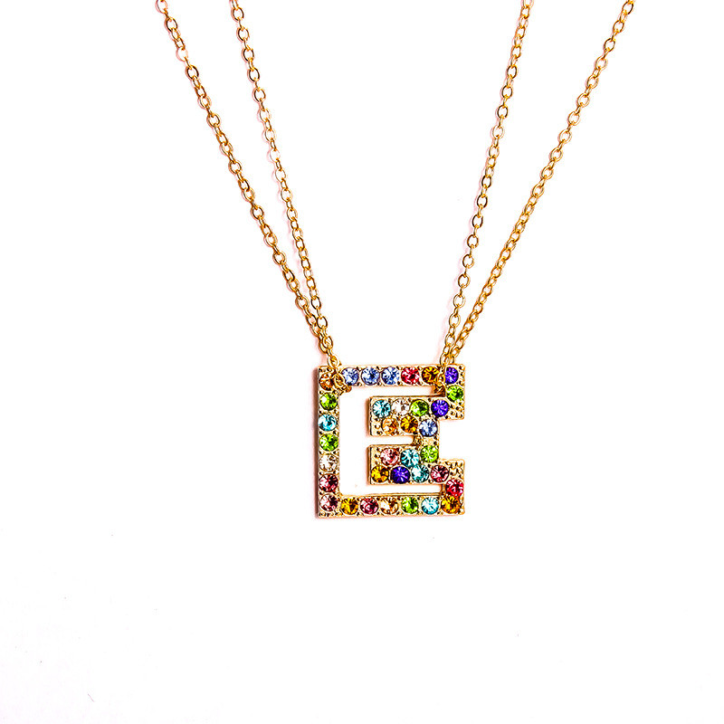 colorful letter pendants in gold
