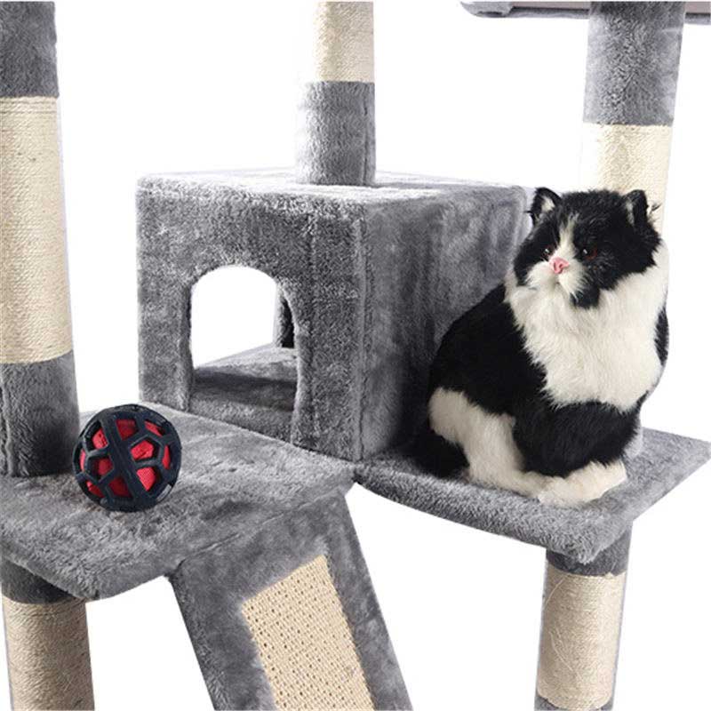 The grey cat crawls with a nest pet product