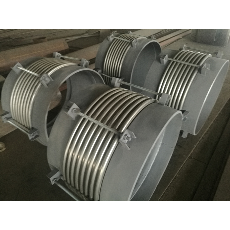 Axial inward pressure bellows expansion joint