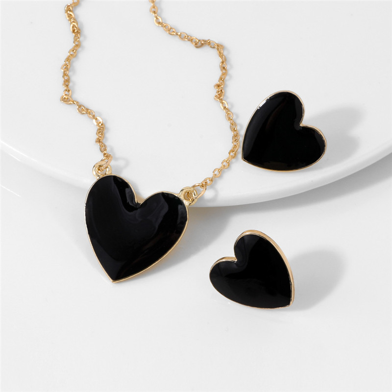 black heart necklace and earrings